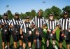 Equipe de arbitragem com kit personalizado do Programa de Desenvolvimento de Árbitros (Foto: David Dermer)