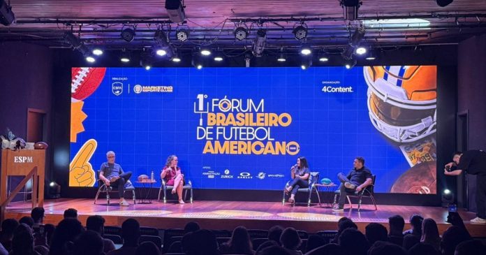 O 1° Fórum reuniu especialistas em comunicação e negócios da modalidade, além de executivos da NFL no dia 2 de setembro do ano passado, na ESPM (Escola Superior de Propaganda e Marketing), em São Paulo. (Imagem: Divulgação CBFA) O 1° Fórum reuniu especialistas em comunicação e negócios da modalidade, além de executivos da NFL no dia 2 de setembro do ano passado, na ESPM (Escola Superior de Propaganda e Marketing), em São Paulo. (Imagem: Divulgação CBFA)